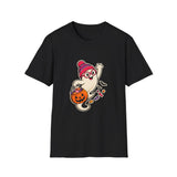 A black short-sleeve crewneck t-shirt featuring a cartoon graphic of a cute ghost wearing a pink and red striped knit hat and glasses, holding a jack-o'-lantern bucket filled with candy.