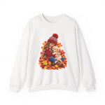 White crewneck sweatshirt featuring a little girl cuddling a golden retriever puppy among autumn leaves