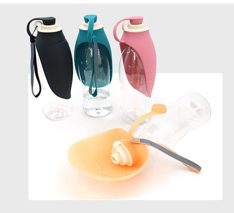 Set of colorful pet water bottles with various designs on a white background