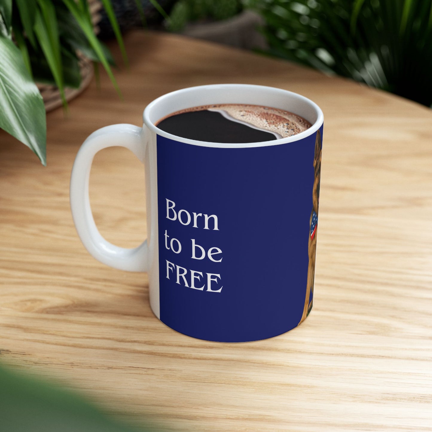 Mug with 'Born to be FREE' text on a wooden table