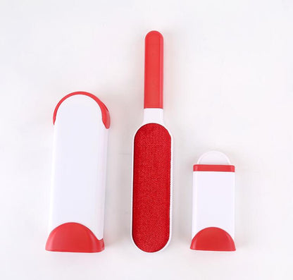 Red and white pet grooming brush set on a white background