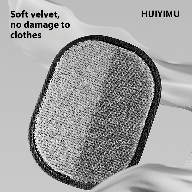 Gray cleaning pad with black border on a white fabric background, featuring the brand 'HUIYIMU'.