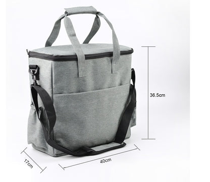 Gray cooler bag with black straps and measurements on a white background