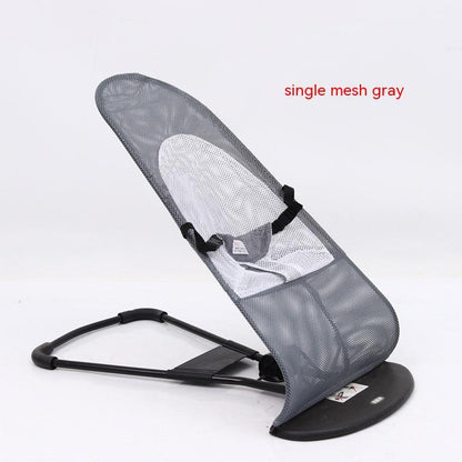 Gray baby bouncer with black base on a white background