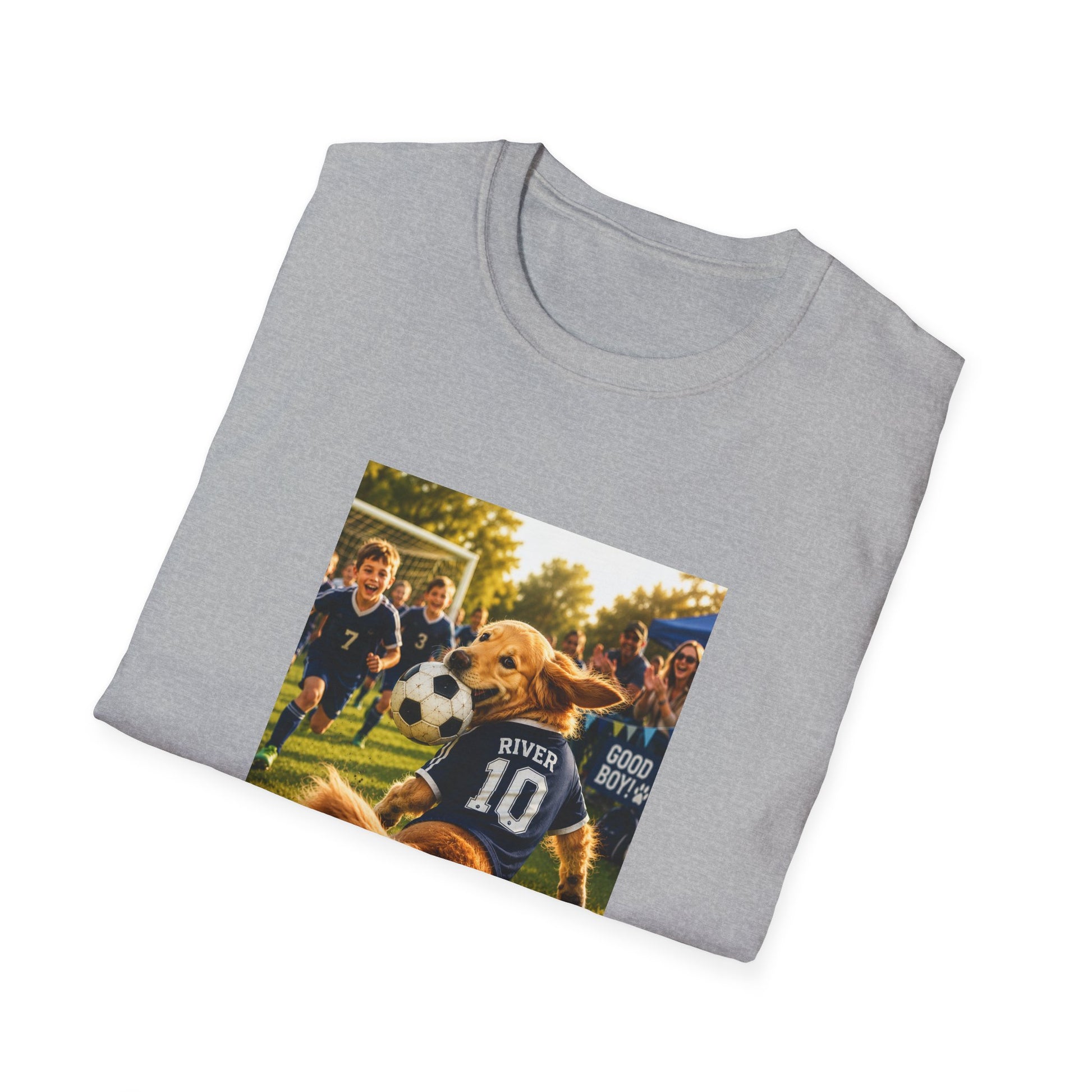 A light gray folded t-shirt with a custom printed graphic of a golden retriever soccer player on a white background.