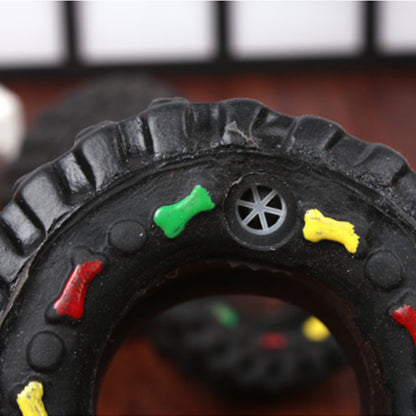 Toy tire with colorful accents on a blurred background