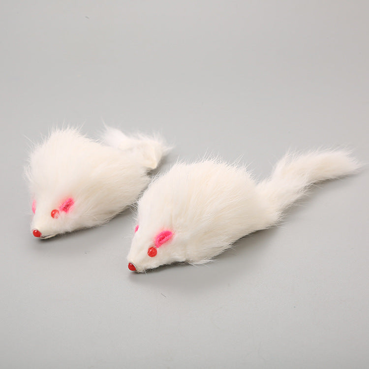 Two white mouse-shaped cat toys with red eyes on a gray background
