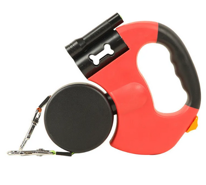 Red and black retractable dog leash with a bone-shaped clip on a white background