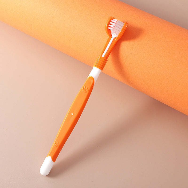 Orange toothbrush with white bristles on a beige background