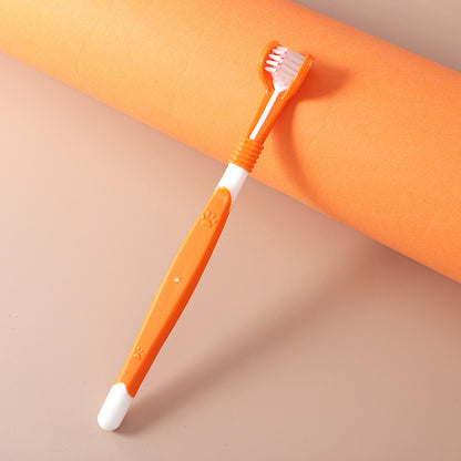 Orange toothbrush with white bristles on a beige background