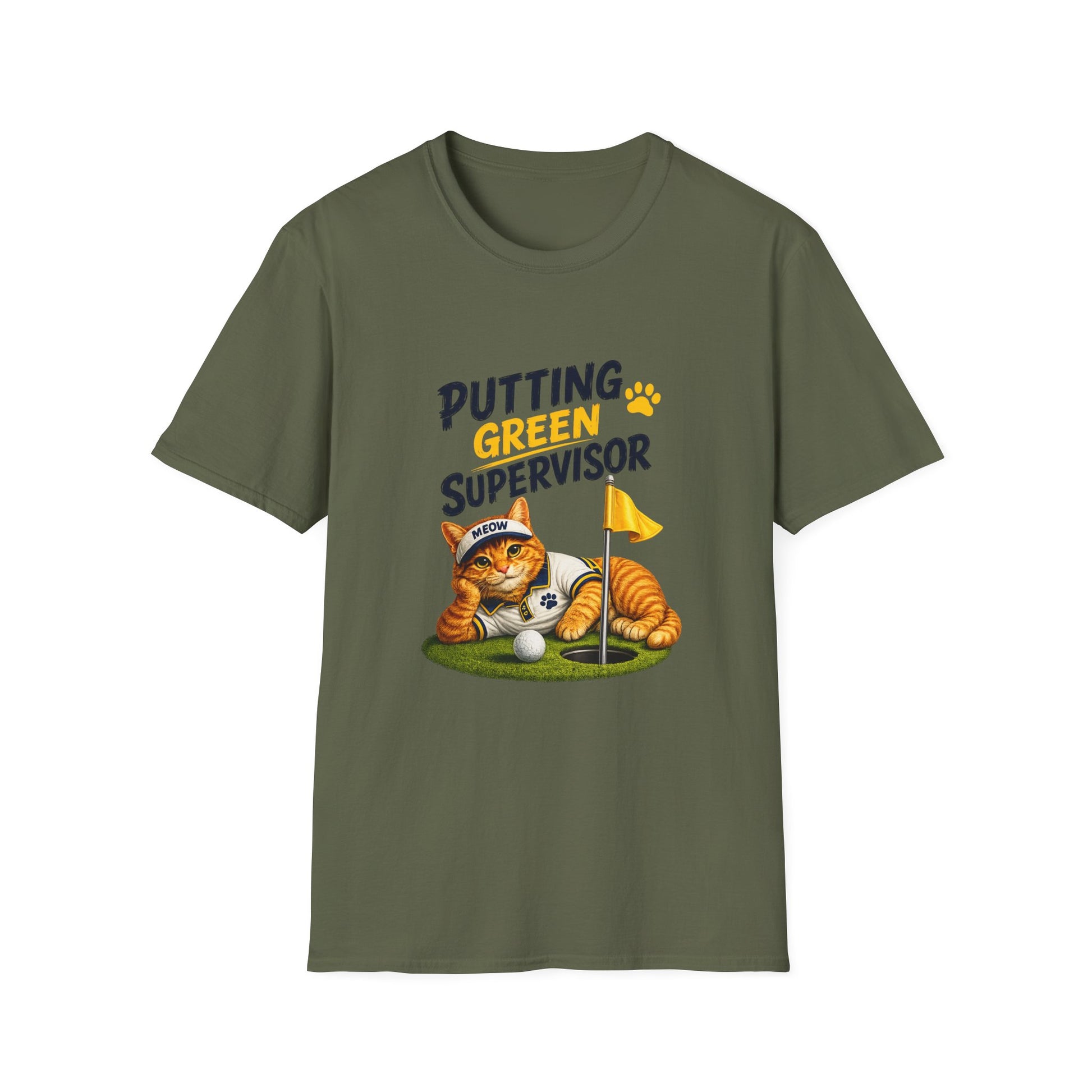 An olive green short-sleeve crewneck t-shirt featuring a graphic of an orange tabby cat wearing a golf headband and shirt, lying down next to a golf hole with a yellow flag and ball. The text 'PUTTING GREEN SUPERVISOR' is printed above the cat.