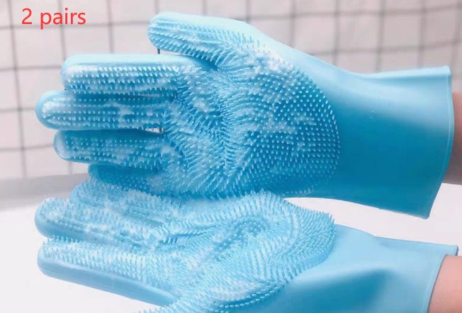 Blue gloves with textured surface on a white background