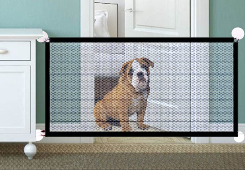 Dog behind a pet safety gate in a home setting