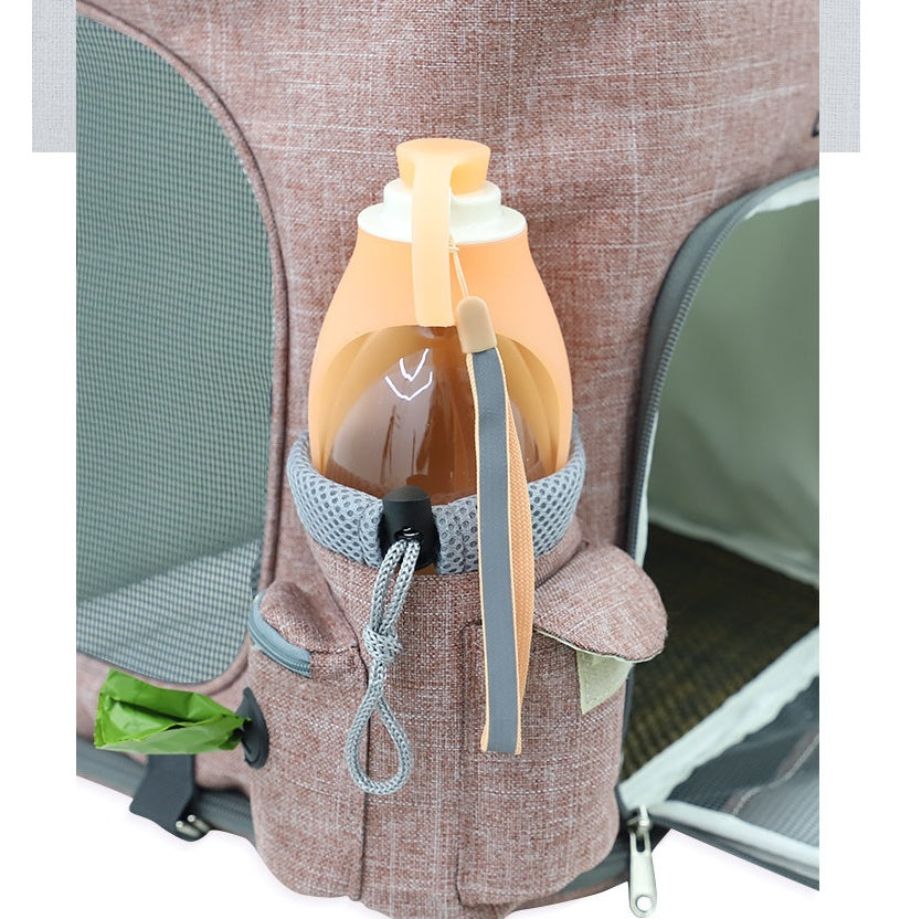 Bottle with a straw attached to a brown bag on a chair