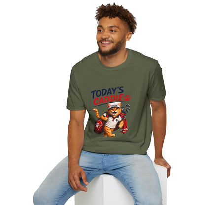 An olive green short-sleeve crewneck t-shirt featuring a cartoon graphic of an orange tabby cat wearing a cap and holding golf clubs, with the text 'TODAY'S CADDIE' 