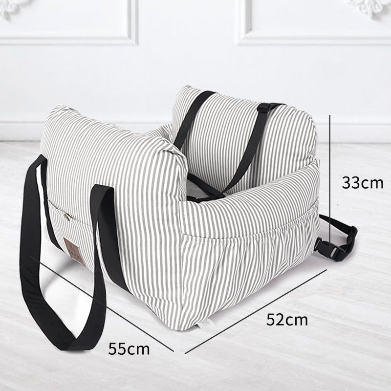 Striped baby seat with black straps and measurements on a white background