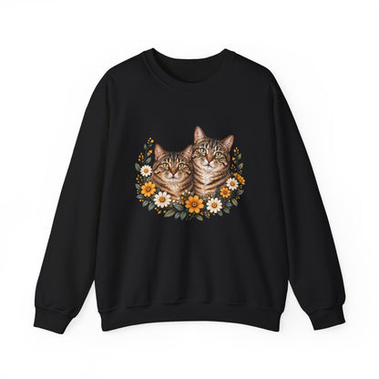 Black crewneck sweatshirt featuring two tabby cats surrounded by orange and white wildflowers