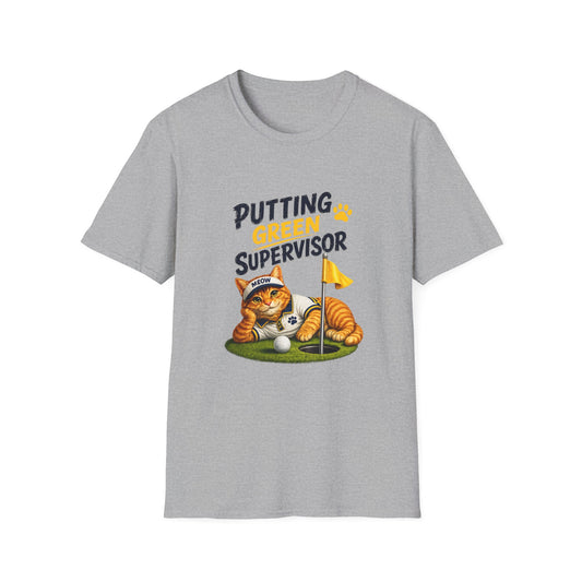 A heather gray short-sleeve crewneck t-shirt featuring a graphic of an orange tabby cat sleeping on a golf green with a golf ball and a yellow flag, with the text 'PUTTING GREEN SUPERVISOR' printed above.