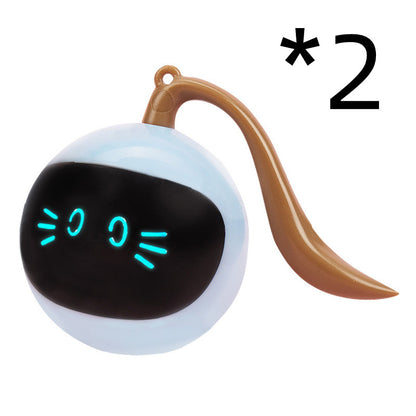 Toy figure of a cat with a surprised expression on a white background