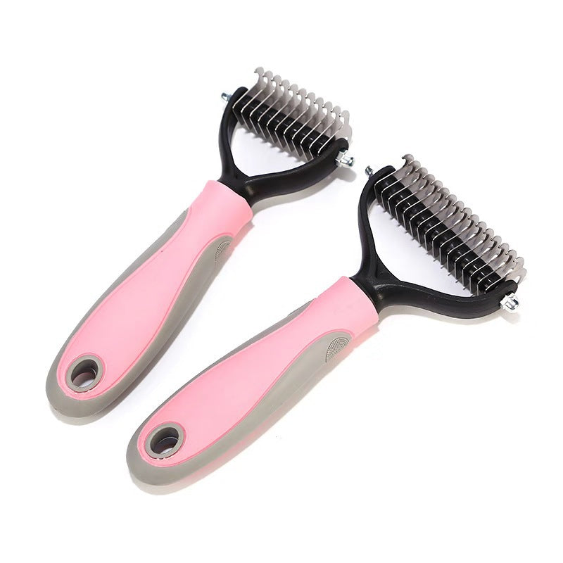 Two pink pet grooming brushes with black bristles on a white background