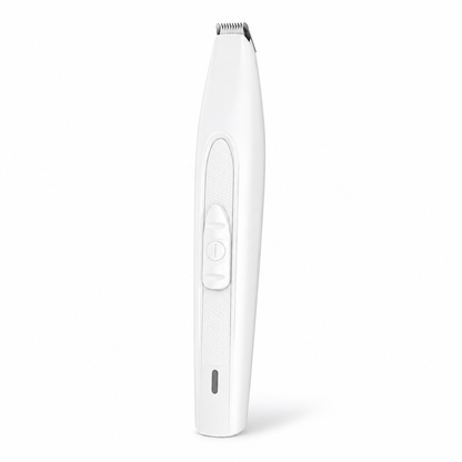 Rechargeable pet hair trimmer used for precision grooming around a dog's paw