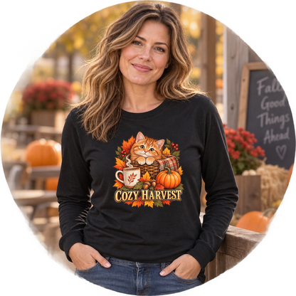 Person wearing a Cozy Harvest kitten long-sleeve shirt with an orange tabby, pumpkin and autumn foliage design
