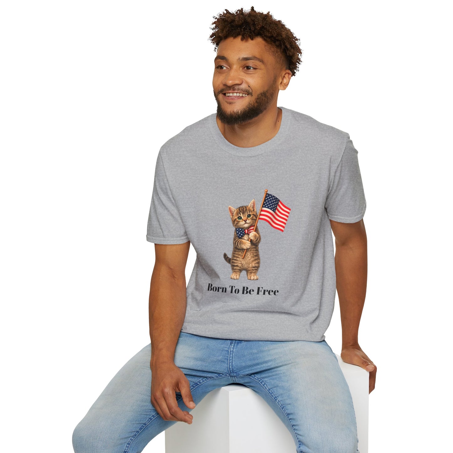 Man wearing a gray t-shirt with a cat holding an American flag graphic and text.
