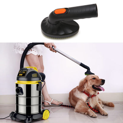 Vacuum cleaner with a brush attachment and a dog sitting on the floor.