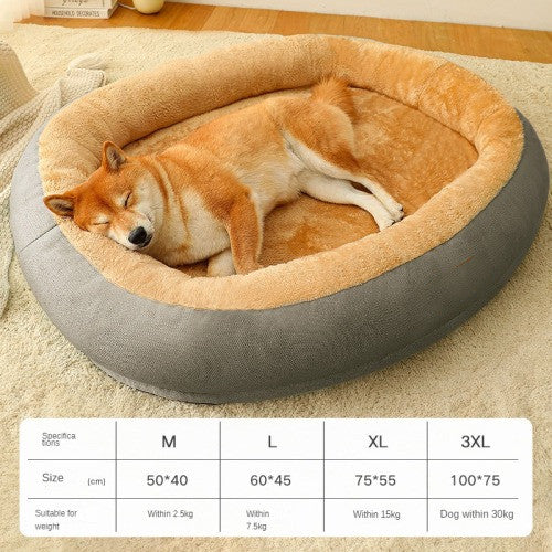 Dog sleeping in a round pet bed with size chart on a carpeted floor.