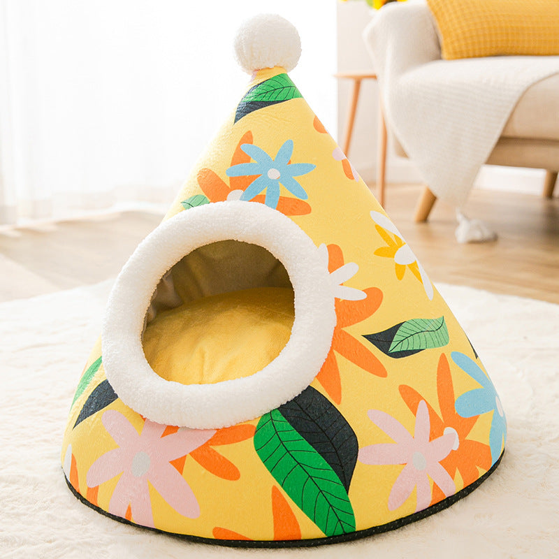 Colorful pet bed with floral pattern on a light background