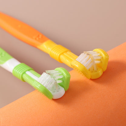 Two children's toothbrushes, one green and one yellow, on a two-tone orange and beige background.