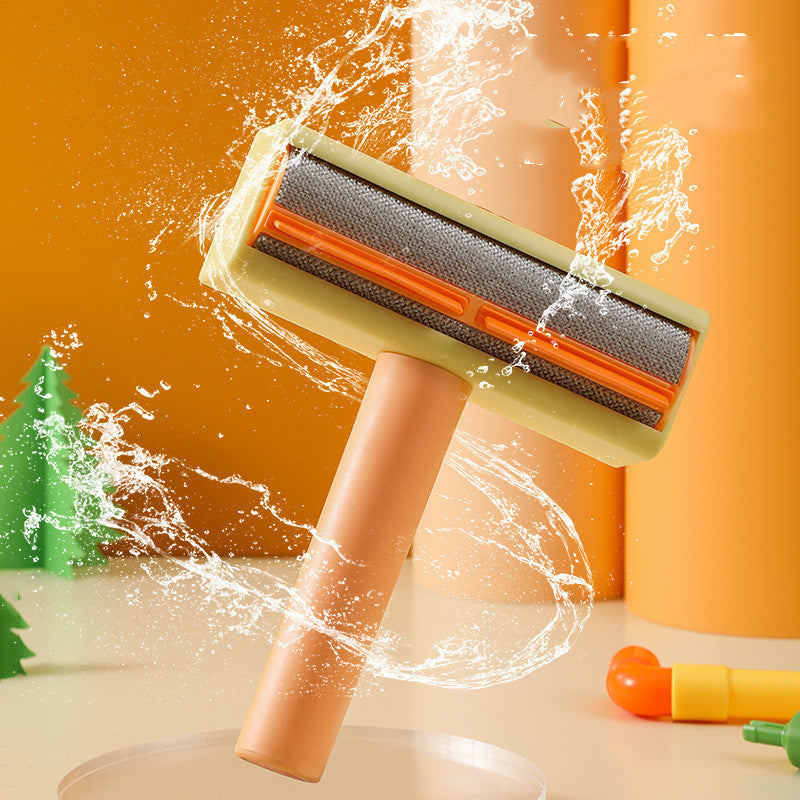 Cleaning tool with water splashes on a bright background