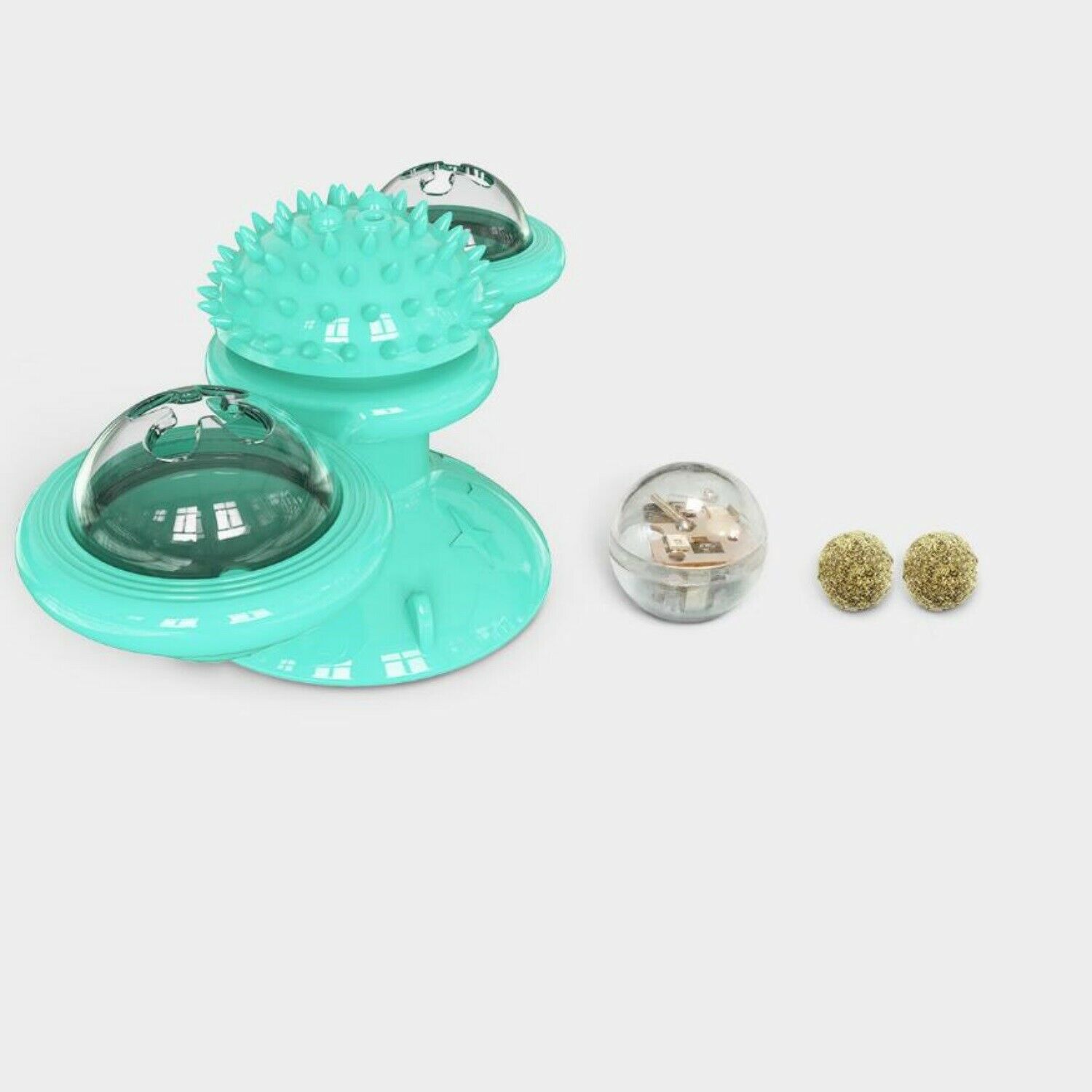 Turquoise pet toy with a transparent ball and small decorative items on a white background