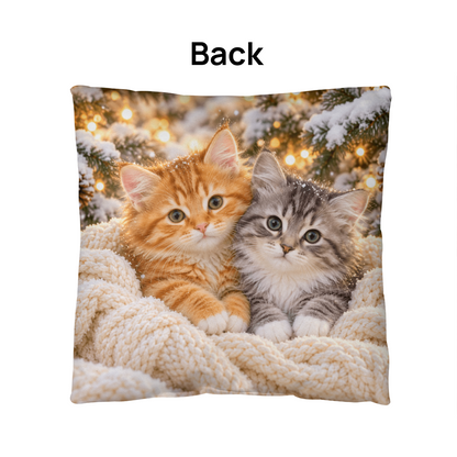 Back of winter kitten throw pillow with snowy evergreens and warm holiday lights