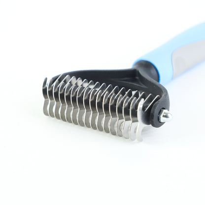 Grooming tool with metal bristles on a white background