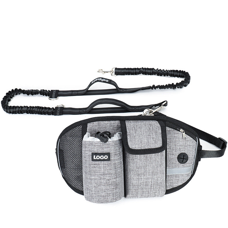 Gray dog walking harness with attached leash on a white background