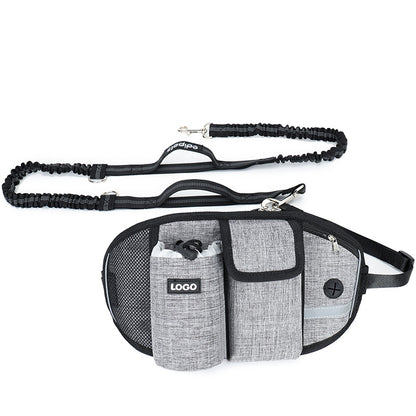 Gray dog walking harness with attached leash on a white background
