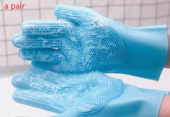 Pair of blue gloves with textured surface on a checkered background