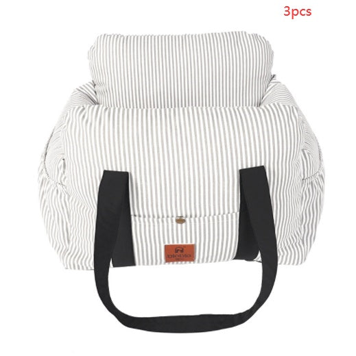 Striped bag with black handles on a white background