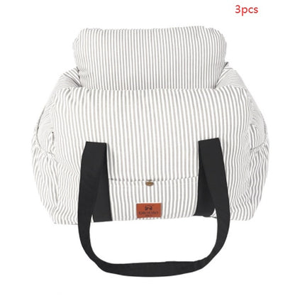 Striped bag with black handles on a white background