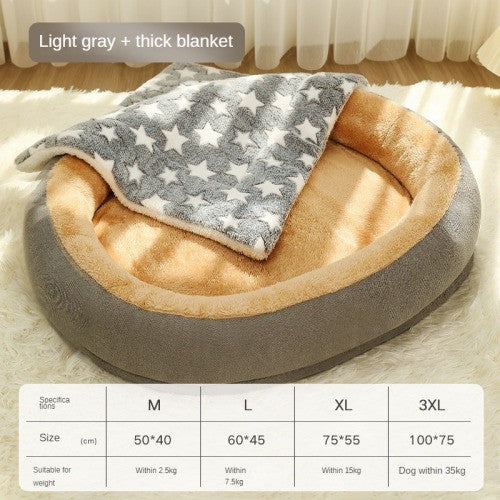 Dog bed with a light gray and white star-patterned blanket on a light gray background.