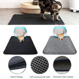 Cat using a black mat with a soft honeycomb design, shown from different angles.