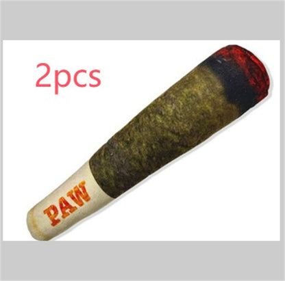 Dog toy resembling a cigar with 'PAW' branding on a gray background