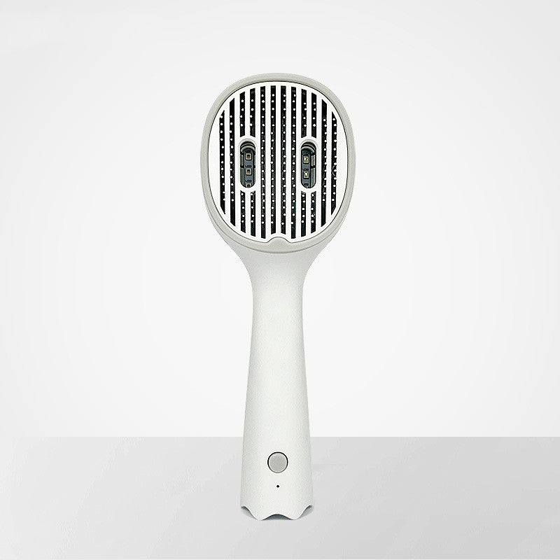 White handheld hair dryer on a light gray background