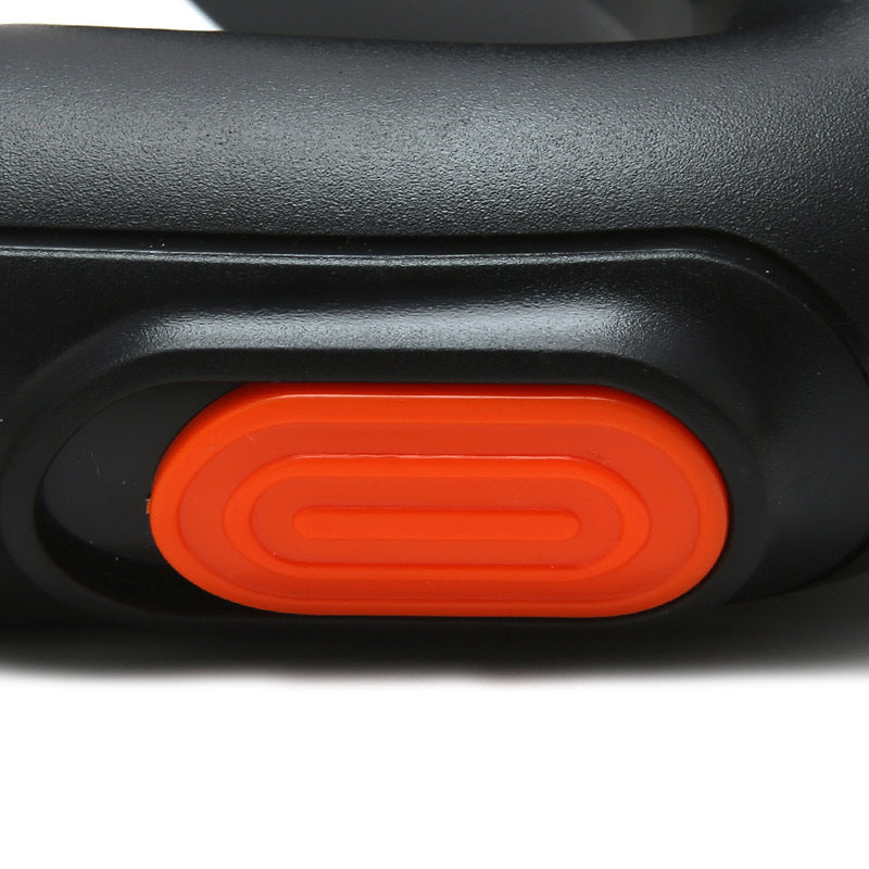 Close-up of a black and orange control panel on a white background