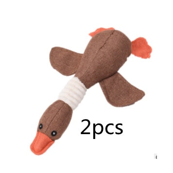 Two brown duck-shaped dog toys on a white background with '2pcs' text.