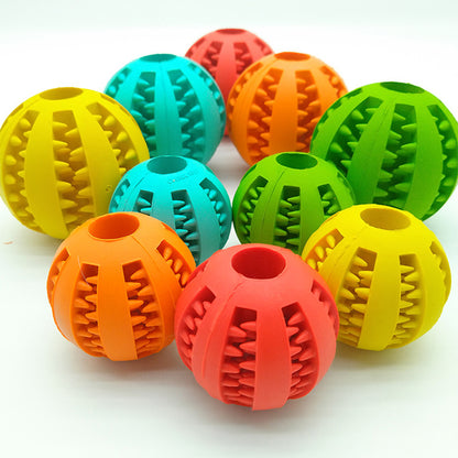 Colorful rubber balls with textured surfaces on a white background