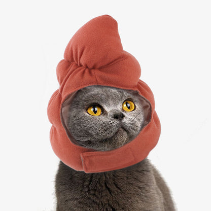 Cat wearing a red hood on a white background