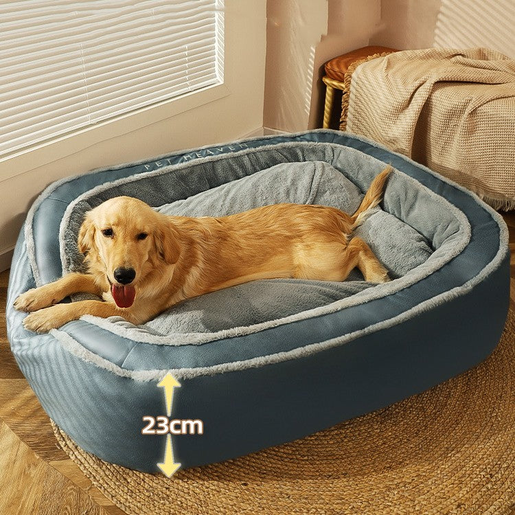 Dog lying on a blue pet bed with dimensions indicated, in a home setting.