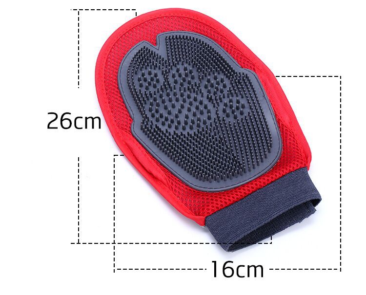 Red grooming glove with black bristle side, shown with dimensions on a white background